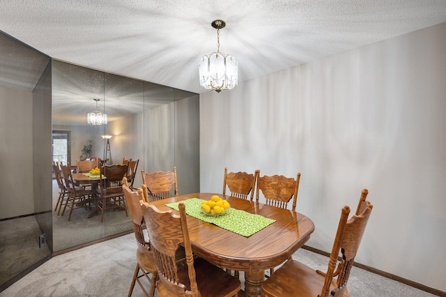 4710 58th Ave N Unit 219, Crystal, MN 55429 - dining area featuring a chandelier, carpet, and a textured ceiling