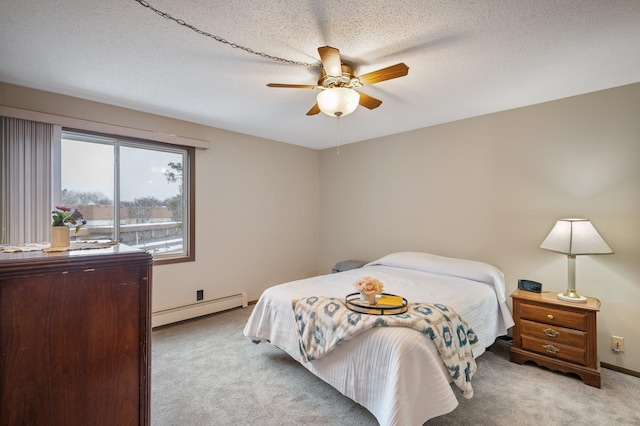 4710 58th Ave N Unit 219, Crystal, MN 55429 - carpeted bedroom with a baseboard heating unit and a ceiling fan
