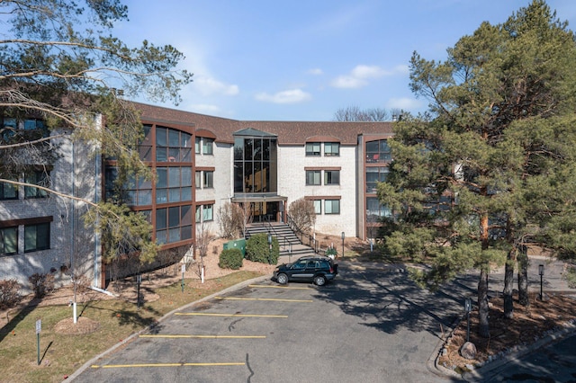 4710 58th Ave N Unit 219, Crystal, MN 55429 - view of property with uncovered parking