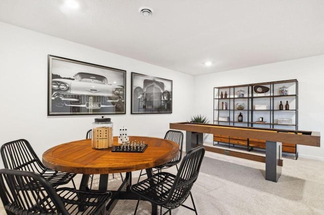 rec room with baseboards, recessed lighting, and carpet