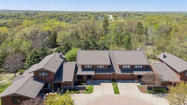 bird's eye view featuring a view of trees
