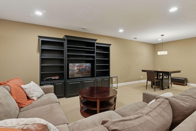 living room with light carpet, baseboards, and recessed lighting