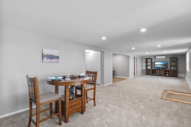 4991 337th Ave NE, Cambridge, MN 55008 - carpeted dining area with recessed lighting, baseboards, and a textured ceiling