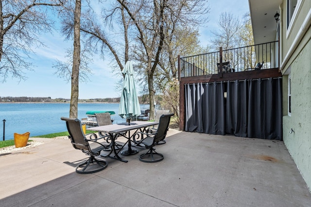 4991 337th Ave NE, Cambridge, MN 55008 - view of patio / terrace featuring outdoor dining space and a water view