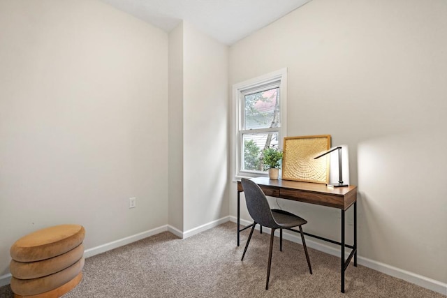 home office with baseboards and carpet flooring