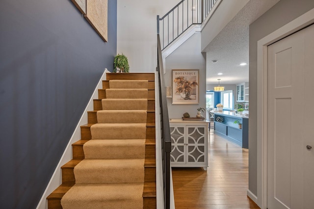 10351 Kittredge Pkwy NE, Otsego, MN 55301 - stairs with wood finished floors and recessed lighting