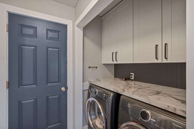 10351 Kittredge Pkwy NE, Otsego, MN 55301 - washroom featuring cabinet space and washing machine and clothes dryer