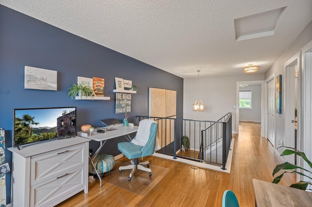 10351 Kittredge Pkwy NE, Otsego, MN 55301 - office space featuring light wood finished floors and a textured ceiling