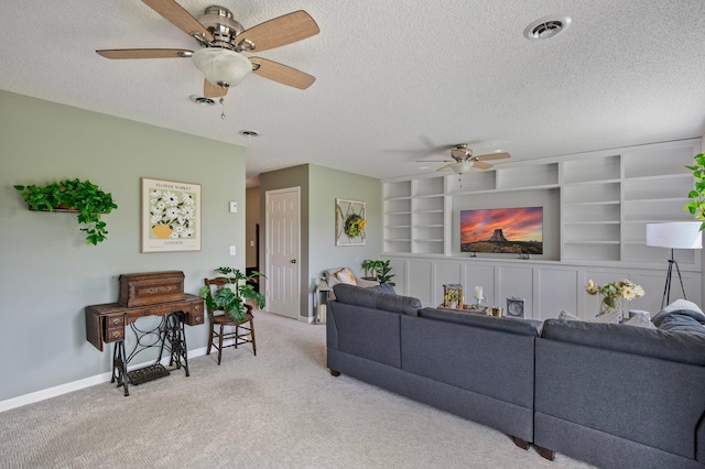 10351 Kittredge Pkwy NE, Otsego, MN 55301 - carpeted living room featuring ceiling fan, a textured ceiling, and built in features