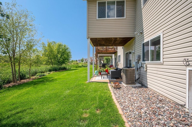 10351 Kittredge Pkwy NE, Otsego, MN 55301 - view of grassy yard with a patio area and an outdoor living space
