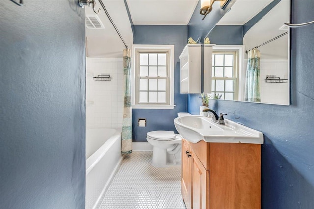 bathroom featuring visible vents, crown molding, tile patterned floors, vanity, and toilet
