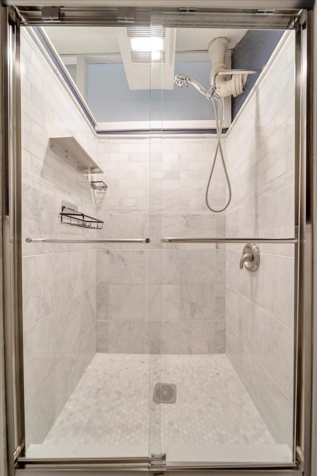 full bath featuring a stall shower