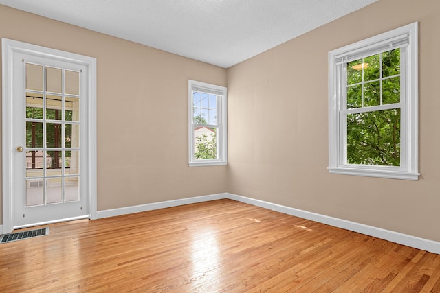 5319 38th Ave S, Minneapolis, MN 55417 - spare room featuring baseboards and light wood finished floors