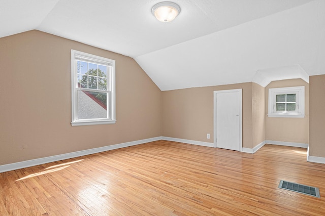5319 38th Ave S, Minneapolis, MN 55417 - bonus room with light wood-style flooring, lofted ceiling, and baseboards