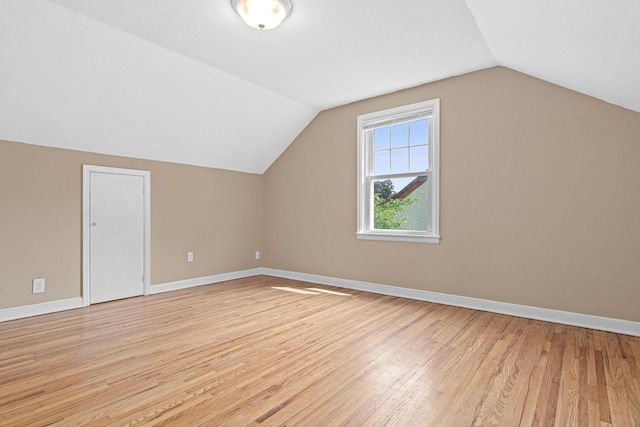 5319 38th Ave S, Minneapolis, MN 55417 - additional living space featuring vaulted ceiling, light wood finished floors, and baseboards
