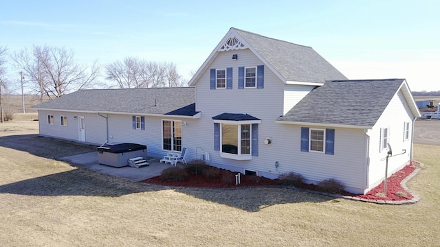 40749 Greencrest Rd, Crow River Twp, MN 56312 - rear view of house with a patio area, roof with shingles, a hot tub, and a yard