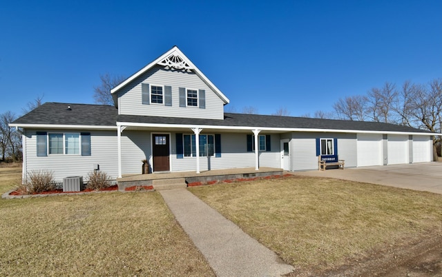 40749 Greencrest Rd, Crow River Twp, MN 56312 - traditional-style house with concrete driveway, a front lawn, an attached garage, a porch, and roof with shingles