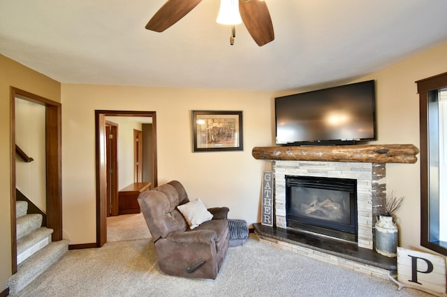 40749 Greencrest Rd, Crow River Twp, MN 56312 - living room with carpet flooring, a fireplace, stairs, and ceiling fan