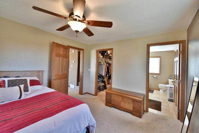 40749 Greencrest Rd, Crow River Twp, MN 56312 - bedroom with light colored carpet, ceiling fan, ensuite bath, and a closet