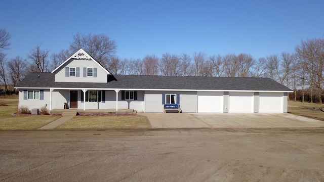 40749 Greencrest Rd, Crow River Twp, MN 56312 - view of front of home with a front yard, concrete driveway, and covered porch