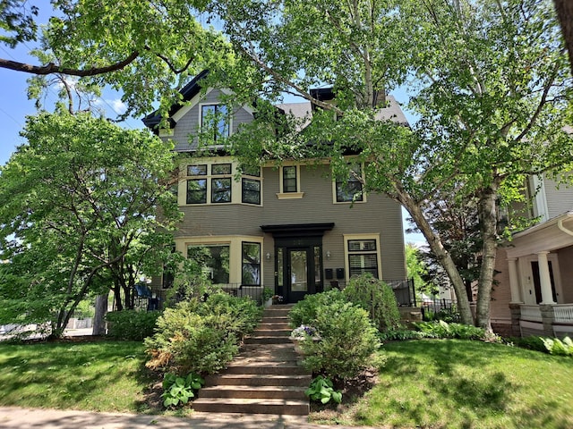 1801 Fremont Ave S Unit 101, Minneapolis, MN 55403 - view of front of home featuring a front yard