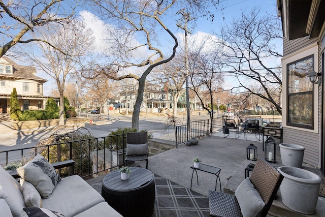1801 Fremont Ave S Unit 101, Minneapolis, MN 55403 - view of patio featuring a residential view and an outdoor hangout area