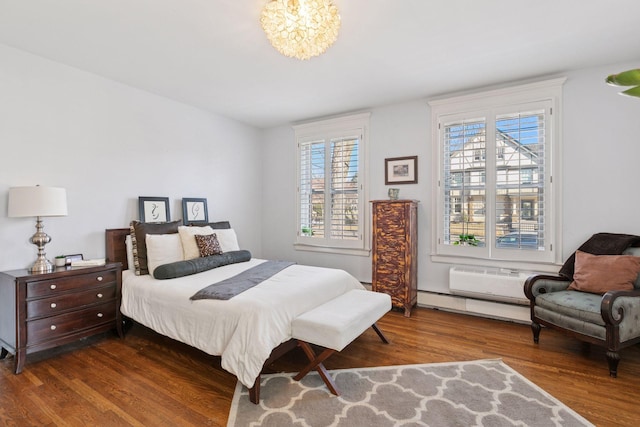 1801 Fremont Ave S Unit 101, Minneapolis, MN 55403 - bedroom with wood finished floors, multiple windows, and a chandelier