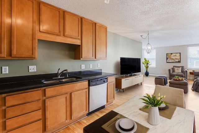 3150 Excelsior Blvd Unit 304, Minneapolis, MN 55416 - kitchen with stainless steel dishwasher, a sink, a textured ceiling, light wood-type flooring, and open floor plan