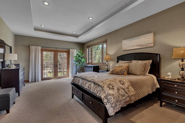3202 Riviera Rd, Sartell, MN 56377 - bedroom with a tray ceiling, access to outside, carpet flooring, and recessed lighting
