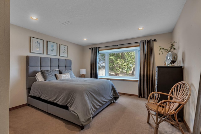 3202 Riviera Rd, Sartell, MN 56377 - bedroom featuring a textured ceiling, visible vents, baseboards, carpet flooring, and recessed lighting
