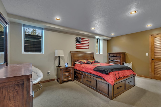 3202 Riviera Rd, Sartell, MN 56377 - bedroom with carpet floors, a textured ceiling, baseboards, and recessed lighting