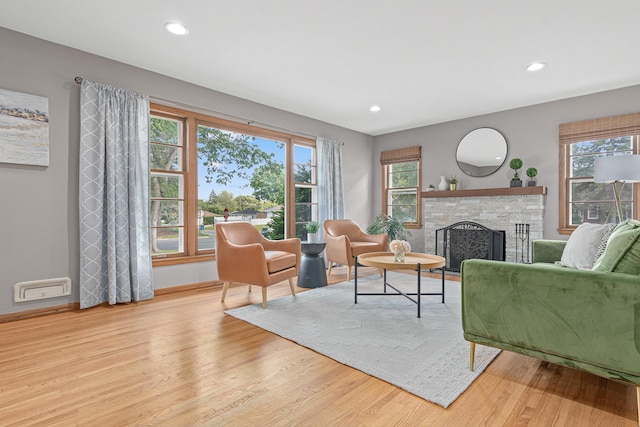 7244 12th Ave S, Richfield, MN 55423 - living room with a fireplace, wood finished floors, and recessed lighting