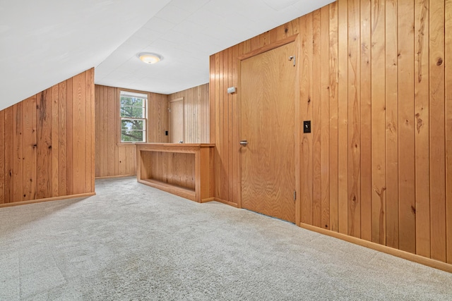 7244 12th Ave S, Richfield, MN 55423 - additional living space featuring wooden walls, carpet flooring, and lofted ceiling