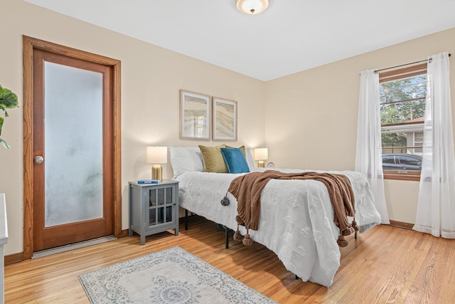 7244 12th Ave S, Richfield, MN 55423 - bedroom featuring wood finished floors and baseboards