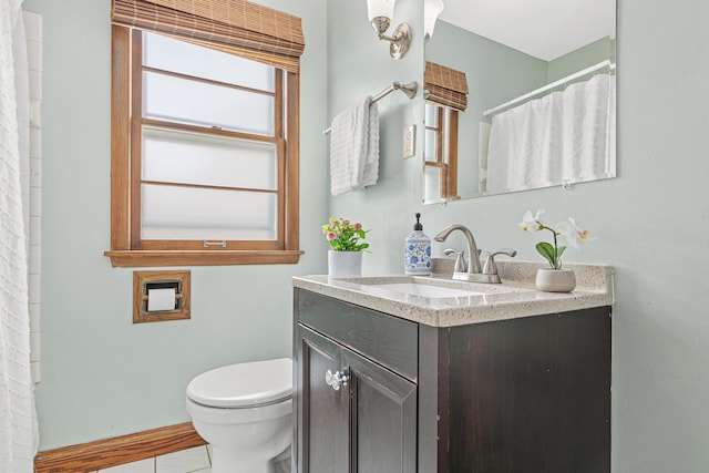7244 12th Ave S, Richfield, MN 55423 - bathroom with vanity, tile patterned flooring, and a shower with shower curtain