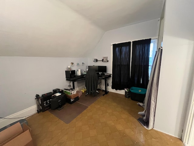 office space featuring vaulted ceiling