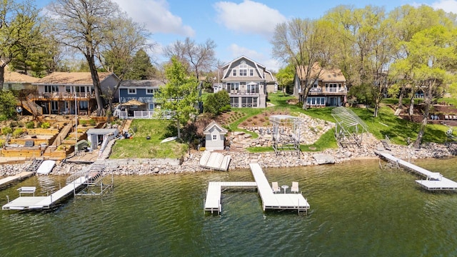 dock area with a deck with water view
