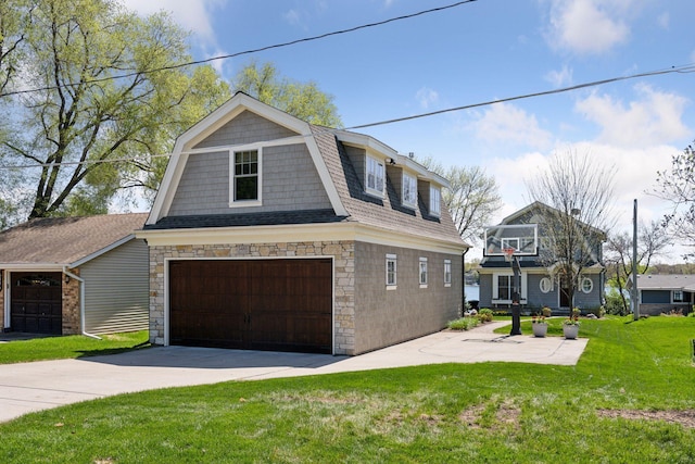 view of front facade featuring an attached garage, stone siding, a front lawn, a gambrel roof, and driveway