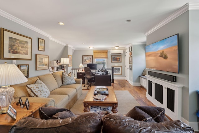 living room with wood finished floors, recessed lighting, crown molding, an AC wall unit, and baseboards