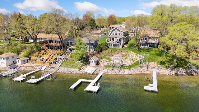 aerial view featuring a water view and a residential view
