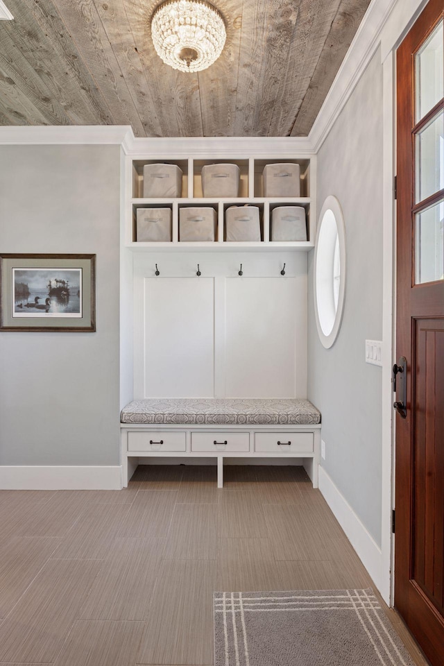 mudroom featuring wooden ceiling and baseboards