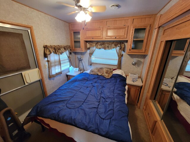 bedroom with carpet and ceiling fan