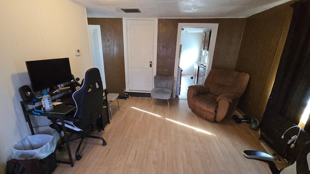 810 11th Ave SW, Austin, MN 55912 - office area with wood finished floors and visible vents