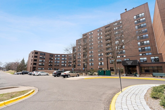 7600 Golden Valley Rd Unit 511, Golden Valley, MN 55427 - view of building exterior with uncovered parking