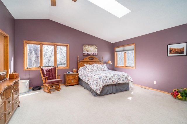 27192 237th Ave SW, Crookston Twp, MN 56716 - bedroom featuring carpet flooring, lofted ceiling, a skylight, ceiling fan, and baseboards