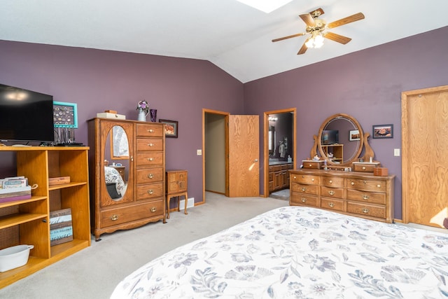 27192 237th Ave SW, Crookston Twp, MN 56716 - bedroom with lofted ceiling, carpet flooring, ceiling fan, baseboards, and ensuite bathroom