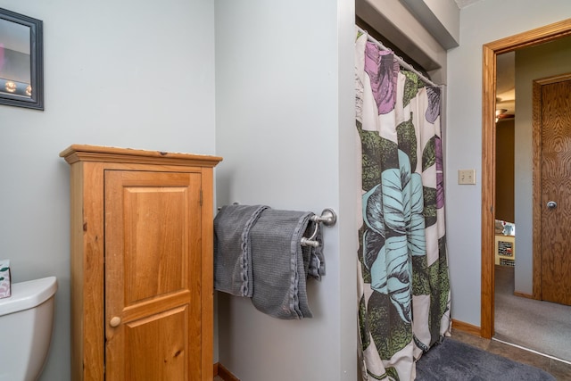 27192 237th Ave SW, Crookston Twp, MN 56716 - bathroom with toilet and a shower with curtain