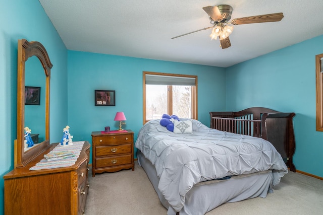27192 237th Ave SW, Crookston Twp, MN 56716 - bedroom featuring light colored carpet and ceiling fan