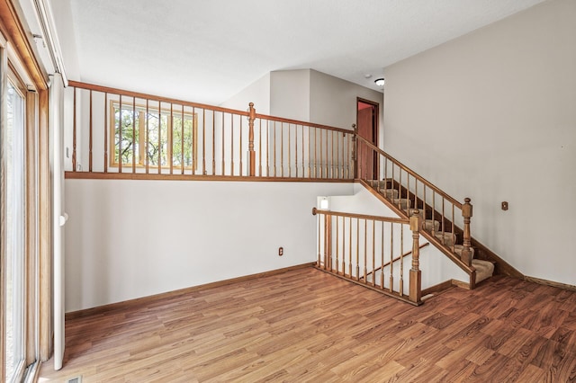 13838 Glendale Trl, Savage, MN 55378 - stairway with wood finished floors and baseboards