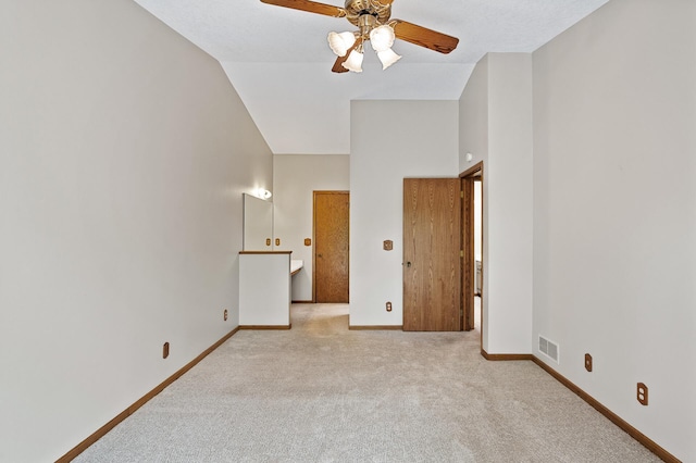 13838 Glendale Trl, Savage, MN 55378 - unfurnished bedroom featuring carpet floors, baseboards, high vaulted ceiling, and ceiling fan